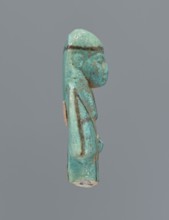 Ushabti, mummy-shaped figurine, preserved upper fragment from the waist up. Arms crossed on the