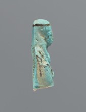 Ushabti, mummy-shaped figurine, preserved head and fragment of torso. Arms crossed on the chest,