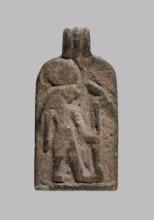 Amulet plaque with the figure of Re: plaque with a flat relief figure of a falcon-headed deity with