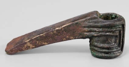 Pounder, unknown Near Eastern workshop; pounder with a low, ribbed, cylindrical socket and a blade