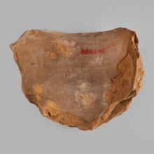 Mask of the god Bes — fragment of a vessel;, Bes Egyptian deity. Egyptian art; Roman period,