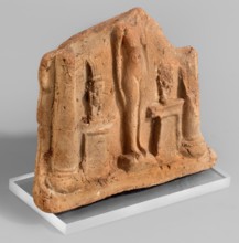 Fragment of a votive plaque in the form of a naos with the fertility goddess Isis-Hathor, and Bes;,