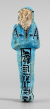 Amenhotep's shabti with baskets on the back; hieroglyphs; headbands; wigs; baskets; hoes; grave