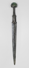 Dagger, unknown Luristan workshop. A fully cast Luristan bronze dagger with a full hilt and a