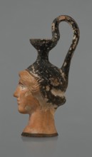 Oinochoe in the shape of a woman's head, Greece, Attica, ca. 450 BC. Oinochoe vessel fashioned from