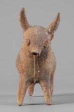 Bull-shaped vessel, Bull-shaped vessel in the shape of a bull standing on widely spaced legs. The