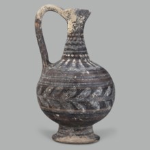 Oinochoe, unknown Cypriot workshop, Arsinoe Cyprus. Oinochoe on a cup-shaped foot with a spherical