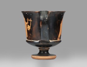 Red-figure kantharos with a depiction of an ephebe with an aryballos and a Greek inscription