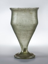 Chalice with a strongly elongated bowl widening upwards to 2/3 of its height, slightly recessed