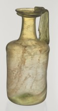 Jug. Cylindrical body, high neck with flared spout and vertical vice. 2nd–3rd century AD. Syria.