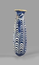 Alabastron, Egyptian workshop, 6th–5th century BC. Opaque dark blue glass alabastron decorated with