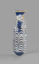 Alabastron, Egyptian workshop, 6th–5th century BC. Opaque dark blue glass decorated with