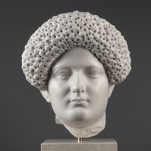 Portrait of a Roman woman, Head with a broad face and an elaborate hairstyle: hair twisted into