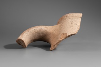 Fragment of the spout and stamped vise of a Sinopean amphora. The spout is a low, semicircular