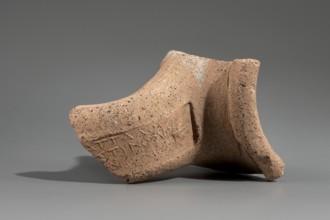 Fragment of a stamped amphora neck, Kinolis c. 290–250 BC. Fragment of a Sinopean amphora neck with