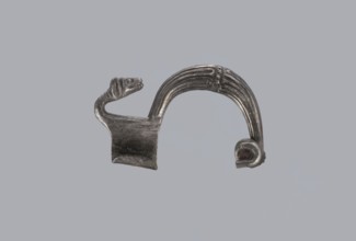 Snake-headed fibula, Southern Italian workshop, fibulae, Italy, snake iconography, silver. Fibula
