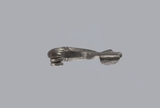 Snake-headed fibula, Southern Italian workshop. Fibula with an arched, thick hoop terminated on one