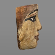 Woman's sarcophagus mask. Mask of wood covered with a layer of canvas to which paint is applied.
