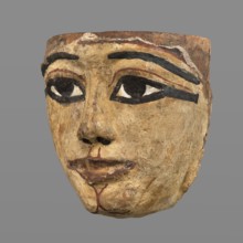 Woman's sarcophagus mask. Mask of wood covered with a layer of canvas to which paint is applied.
