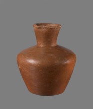 Jug, ceramics, Egyptian pottery. Medium-sized clay jug with a biconical body, widest at about half