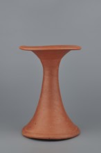 Bowl base. Base for a vessel with an almost equal diameter of both rims; both rims are irregular,