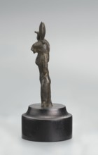 Sekhmet figurine, lion-headed goddess shown standing or walking. Lioness head with a tripartite wig