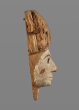 Sarcophagus mask with fragment of a high wig above the forehead, decorated on the edge of the