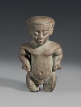 Figurine/amulet of a Ptah-dwarf Pataikos, naked dwarf man with a large head and wide forehead,