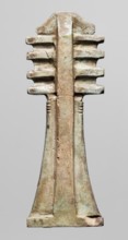 Amulet — djed pillar. Amulet in the shape of the djed hieroglyph with a pillar at the back; at the