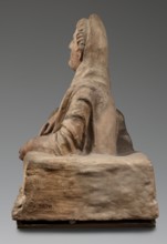 Sarcophagus lid, The deceased is shown in a semi-reclining position, resting his left forearm on a