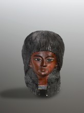 Mummy mask of a boy. The mask of a boy with a delicately modeled, almost girlish face is framed by