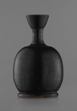 Black-finished aryballoi lekythos, Greek black-glazed pottery. Aryballoi lekythos coated with black