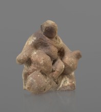 Terracotta figurine of Silenus, Silenus mythology; terracotta. Figurine of an obese Silenus sitting