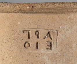Stamped transport amphora with a Greek inscription Argeio — transport amphora with a pointed bottom