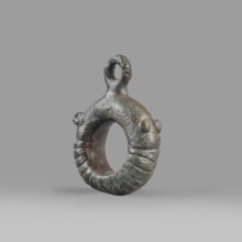 Decorative pendant from a horse harness, unknown Near Eastern workshop. The pendant is in the form