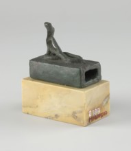 Snake sarcophagus; Snake with raised head, coils on a rectangular reliquary-sarcophagus—probably