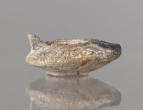 Oil lamp, Islamic art; Arabic culture; functional ceramic oil lamp. Oval lamp with short burner