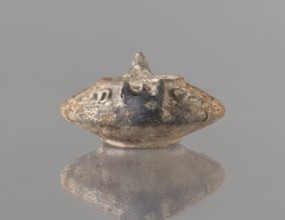 Oil lamp, deposit provenance, Islamic art, Arabic culture, functional ceramics, Arabic pottery, oil