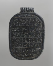Heart scarab, Pectoral scarab with nine lines of hieroglyphic text containing Chapter 30B of the