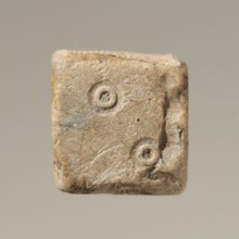 Six-sided dice with pips 1–6 shown as hollow circles and dots; material unspecified; maker and