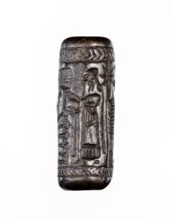 Cylinder seal, unknown Neo-Assyrian workshop. Seal in the so-called linear style with a