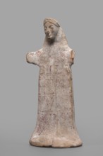 Idol with a full-bodied female head, Standing female figure with a torso flattened on both sides, a