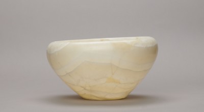 Bowl, stone vessel; large bowl with a small flat bottom, slightly flared side walls at the top bent