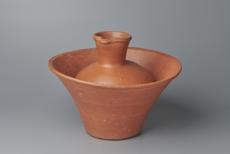 Deep bowl. Deep, cup-shaped bowl with a slightly convex bottom and sides arching upwards; straight,