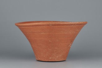 Deep, cup-shaped bowl with a slightly convex bottom and sides arching upwards; straight, flat,