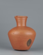 Jug, Medium-sized biconical clay jug with wide, sloping shoulders and a wide neck that is almost