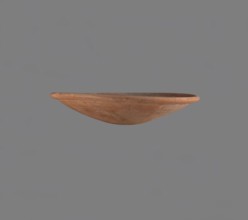 Bowl, Low bowl with a rounded bottom and a widening, rounded rim. Nile clay, fine-grained,