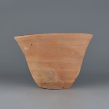 Cake baking mold so-called flower pot for baking bread with a conical shape and a flat bottom.
