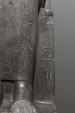 Statue of the goddess Sekhmet, Sekhmet mythology. Woman with a lioness's head seated on a throne,