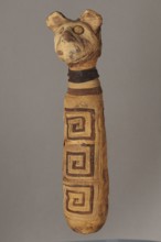 Cat mummy, cat mummy decorated with a meander made of white and brown bandages. 30 BC–395 AD, Roman